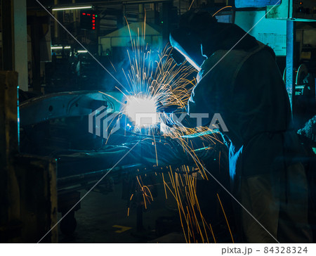 Industrial steel welder in factory 84328324