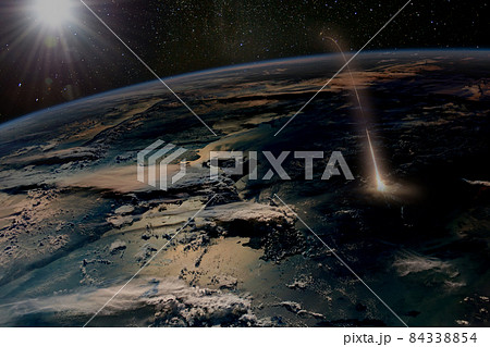 Missile launch at the mornong, aerial view from space. Elements of this image furnished by NASA. Missile launch at the mornong, aerial view from space. Elements of this image furnished by NASA. 84338854