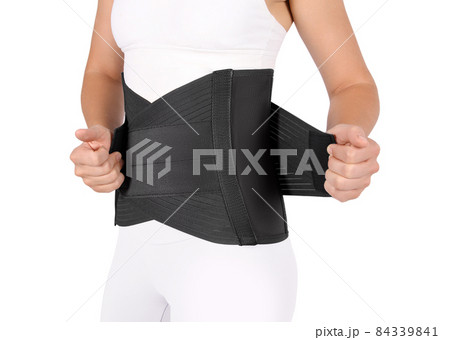 Orthopedic lumbar corset on the human body. Back brace, waist