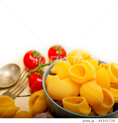 Italian snail lumaconi pasta with tomatoes 84341730
