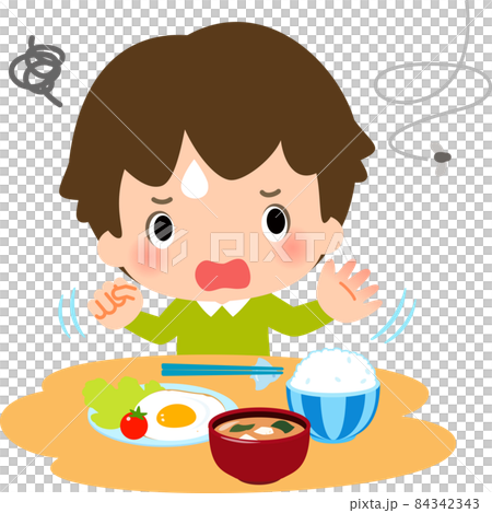 食卓でハエを追い払う男の子 84342343