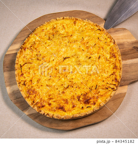 Vegetarian quiche recipe with winter vegetables, carrot, celery, potato Vegetarian quiche recipe with winter vegetables, carrot, celery, potato 84345182