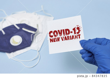 Doctor hand holds a card with text - New covid variant Omicron. Covid-19 new variant - Omicron. Omicron variant of coronavirus. SARS-CoV-2 variant of concern Doctor hand holds a card with text - New covid variant Omicron. Covid-19 new variant - Omicron. Omicron variant of coronavirus. SARS-CoV-2 variant of concern 84347835