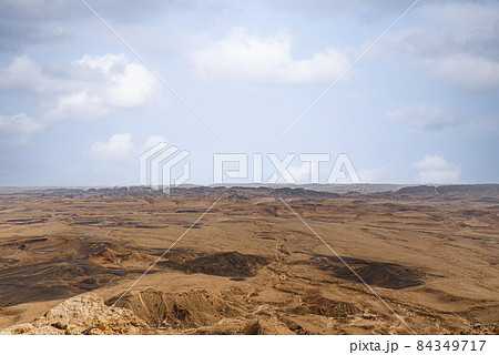 Ramon Crater Makhtesh Ramon, the largest in the world, as seen from the high rocky cliff edge surrounding it from the north, Ramon Nature reserve, Mitzpe Ramon, Negev desert, Israel Ramon Crater Makhtesh Ramon, the largest in the world, as seen from the high rocky cliff edge surrounding it from the north, Ramon Nature reserve, Mitzpe Ramon, Negev desert, Israel 84349717