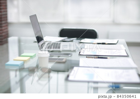 laptop and clipboard on the desktop in the office.photo with copy space 84350641