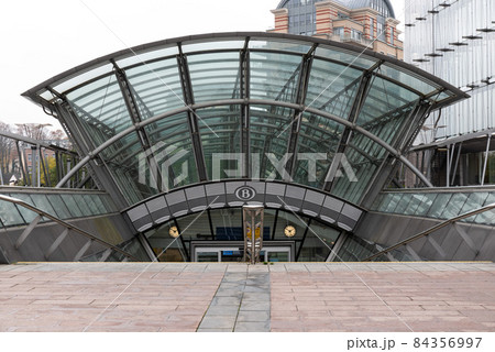 Ixelles, Brussels Capital Region, Belgium - 11 19 2021: Entrance of the Luxemburg railway station at the esplanade of the European Parliament 84356997