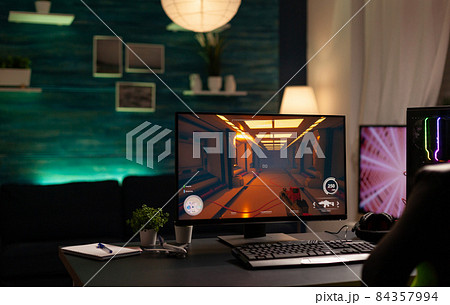 Empty room with online video games on computer 84357994