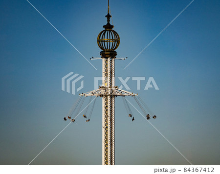 Tall attraction Amusement park. Concept of fun and happiness 84367412