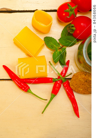 Italian pasta paccheri with tomato mint and chili pepper 84368666