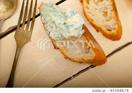 fresh blue cheese spread ove french baguette fresh blue cheese spread ove french baguette 84368678