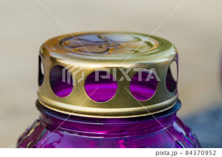 Metal lid of grave candle. Metal lid of grave candle. 84370952