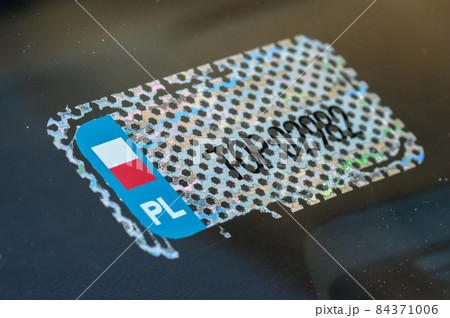 Removed one layer of polish sticker with register number of car inside of windshield. 84371006