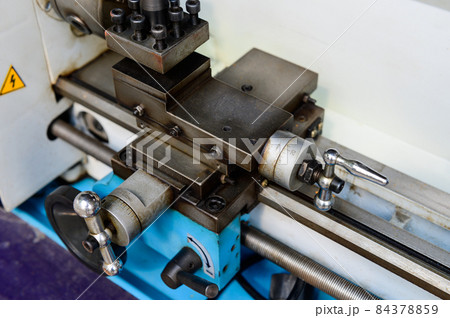 Industrial machine in the factory with lathe Industrial machine in the factory with lathe 84378859