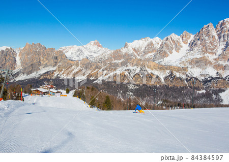 Alpine skier on slope at Cortina Alpine skier on slope at Cortina 84384597