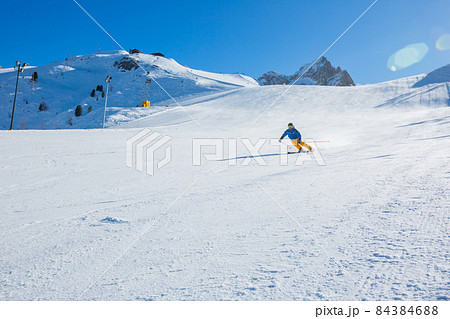 Alpine skier on slope at Cortina Alpine skier on slope at Cortina 84384688
