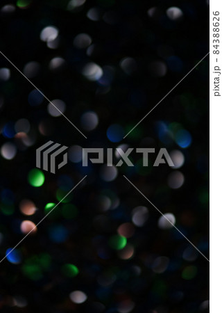 Dark multicolored bokeh.  84388626