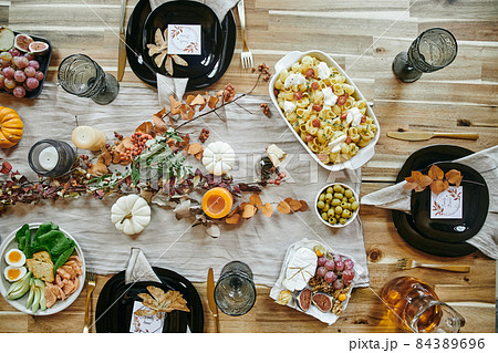 Flatlay of homemade food on festive table served for family dinner 84389696