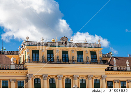 View of beautiful sculpture decorated on the roofline of Schonbrunn palace. 84393686