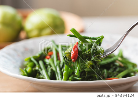 Northern Thai food, Stir fried chayote shoot leaf, Local Thai food Northern Thai food, Stir fried chayote shoot leaf, Local Thai food 84394124