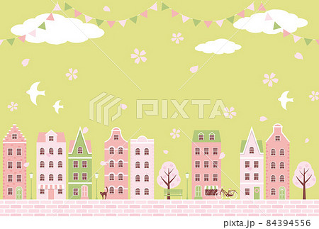 桜の花が舞っている春の街並みのイラストの背景素材 84394556