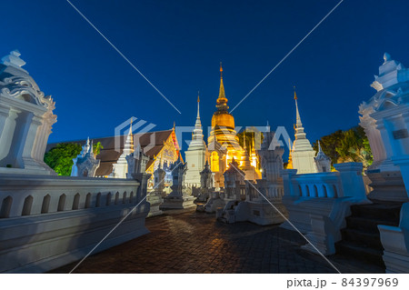 Wat Suan Dok is a Buddhist temple (Wat) at twilight night sky background is a major tourist attraction in Chiang Mai Northern Thailand.Travels in Southeast Asia. 84397969