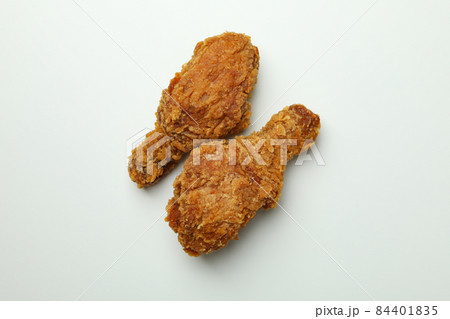Tasty fried chicken on white background, close up 84401835