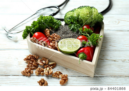 Healthy lifestyle accessories on white wooden table 84401866