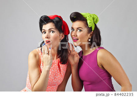 Beautiful women talking . Beautiful women talking . 84402235