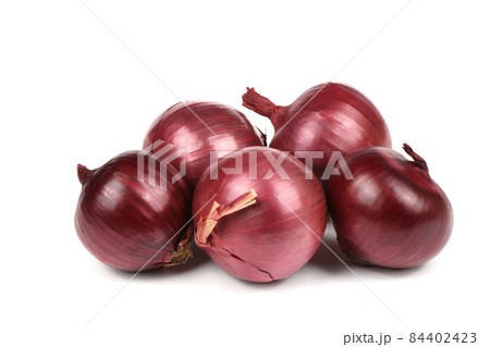 Red onion bulb isolated on white background. Red onion bulb isolated on white background. 84402423