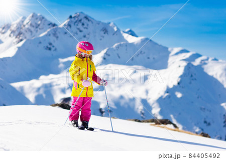 Ski and snow fun. Kids skiing. Child winter sport. Ski and snow fun. Kids skiing. Child winter sport. 84405492