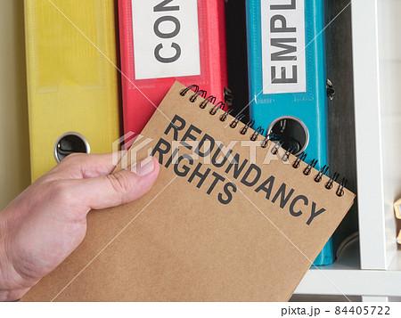 An employee holds info about redundancy rights. 84405722