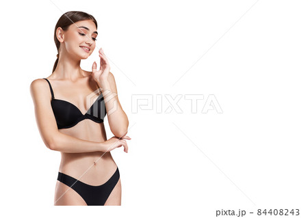 beautiful slim woman with perfect body in black underwear 84408243