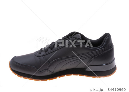 black leather sneakers isolated 84410960