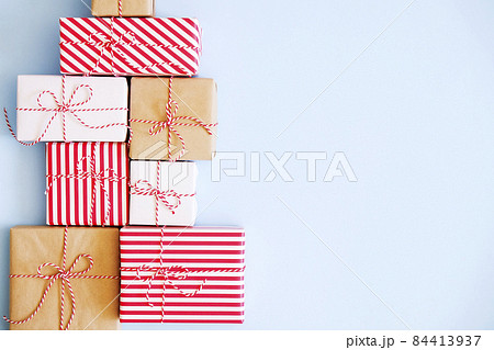 Rustic composition with different presents for winter season holidays. Rustic composition with different presents for winter season holidays. 84413937