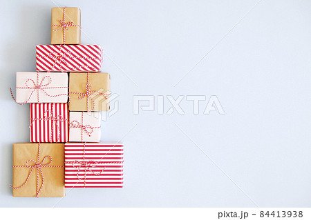 Rustic composition with different presents for winter season holidays. Rustic composition with different presents for winter season holidays. 84413938