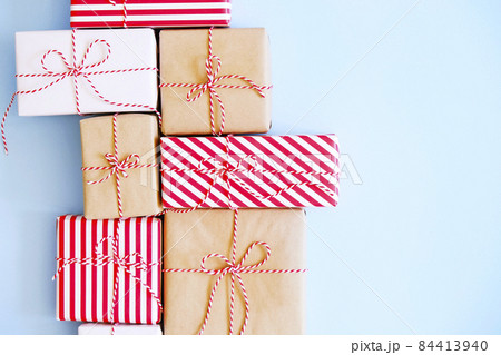 Rustic composition with different presents for winter season holidays. Rustic composition with different presents for winter season holidays. 84413940