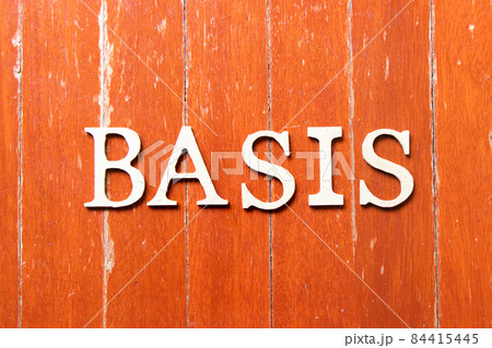 Alphabet letter in word basis on old red color wood plate background 84415445