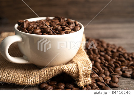 Coffee bean in cup, import export trade commerce. 84416246