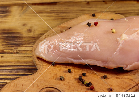 Sliced Raw Chicken meat on the cutting board, 🇩🇪Professio…