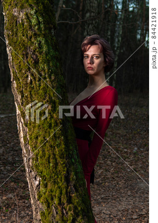 Girl walking vintage park, season trunk day background country, mountain landscape. Dress white, serenity jacket 84421918