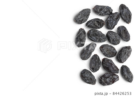 Black raisin isolated on white background with clipping path. Top view with copy space for your text. . Flat lay 84426253
