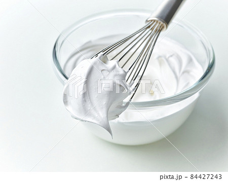 bowl of whipped egg whites cream bowl of whipped egg whites cream 84427243