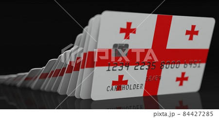 Domino effect, fallen credit cards with flags of Georgia. Fictional data on card mockups. Banking collapse conceptual 3d rendering Domino effect, fallen credit cards with flags of Georgia. Fictional data on card mockups. Banking collapse conceptual 3d rendering 84427285