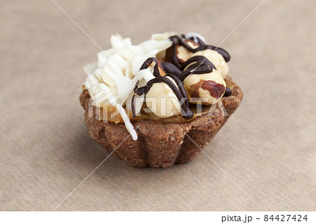 chocolate cake with nougat and roasted hazelnuts chocolate cake with nougat and roasted hazelnuts 84427424