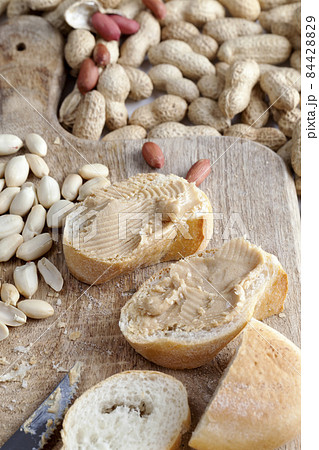 delicious peanut butter and white bread, close up 84428829