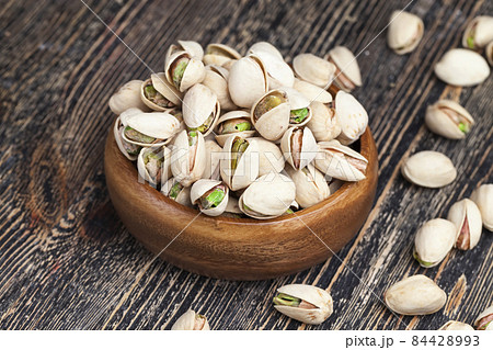delicious natural dried and salted pistachio nuts delicious natural dried and salted pistachio nuts 84428993