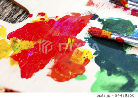 mixed together multi-colored paints for creativity and drawing 84429250