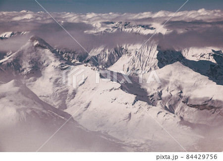 amazing snow covered peaks in the Swiss alps Jungfrau region from Schilthorn amazing snow covered peaks in the Swiss alps Jungfrau region from Schilthorn 84429756