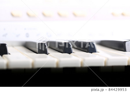 piano keyboard in a gentle air of retro style musical background selective soft focus piano keyboard in a gentle air of retro style musical background selective soft focus 84429953