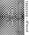 glasses with water and reflections on black and white checkered background 84430981